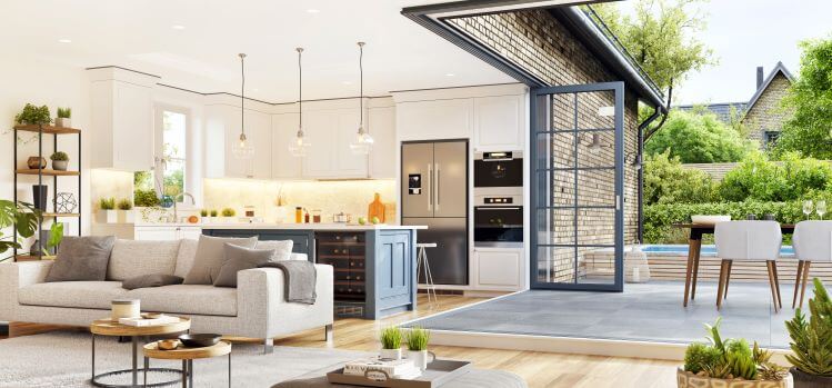 Modern open plan living room with beautiful kitchen. Cozy patio area with garden furniture