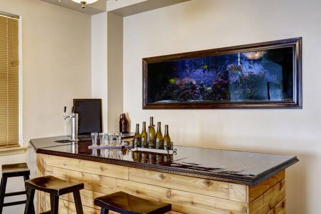 Guide to Home Bar Shelving luxury home bar with aquarium