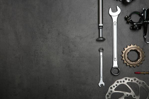 Some bike maintenance tools including spanners and screwdrivers